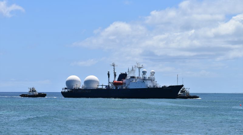 A ship on the sea with liquefied natural gas storage