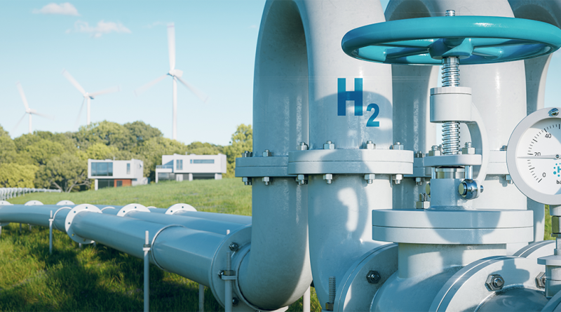 Image of a very large hydrogen tank in front of a green meadow background to support renewable hydrogen article