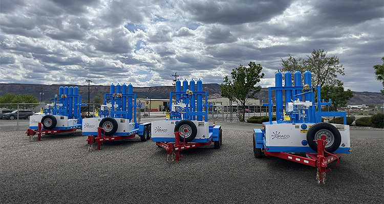 four portable air compressor units manufactured by Graco